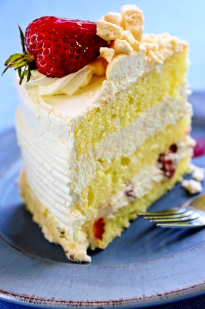 istock Slice of strawberry meringue cake 695995040