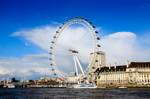 The London Eye on the River Thames, in London England
