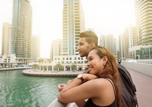 Young couple on vacation in Dubai Marina