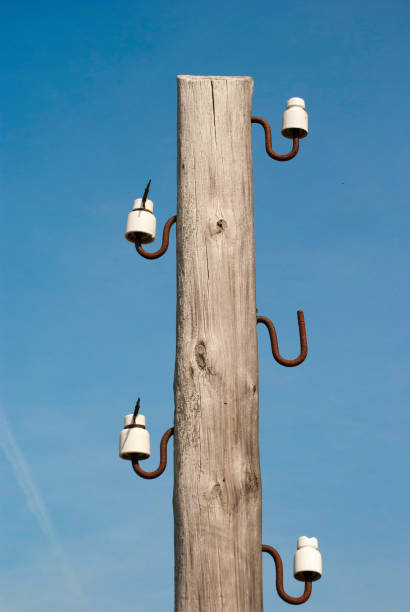 istock Abandoned old electric pillar without wires 696025632