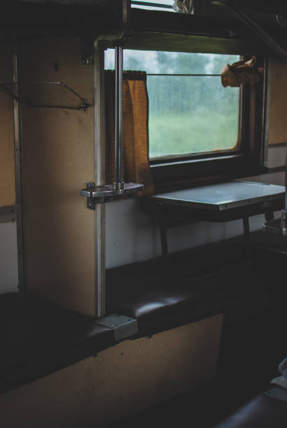 istock Old abandoned soviet train car. Places for passangers 696029126