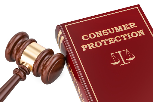 Consumer protection concept with gavel and book, 3D rendering