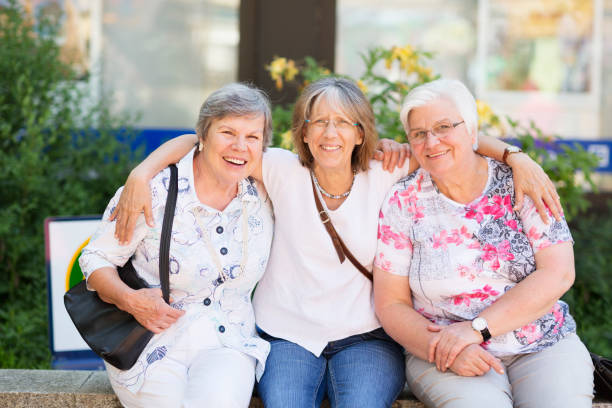 istock Senior women friends  having fun together 696039634