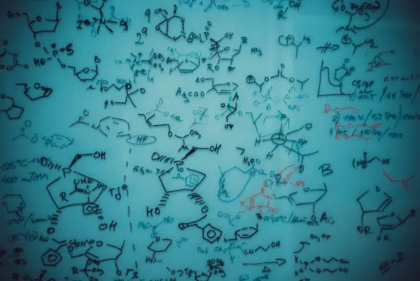 Hand-drawing background. Chemical formulas on a blackboard.