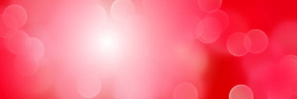 istock intense bokeh effect banner background in shades of red and white 696042818