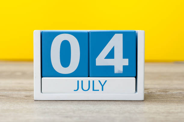istock July 4th. Image of july 4 calendar on yellow background. Summer day. Empty space for text. Independence Day Of America 696045912