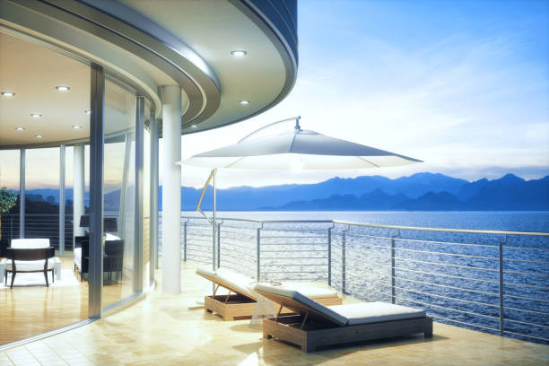 The view in to the balcony of rooftop background the ocean. House of the sea. wind blow the curtain