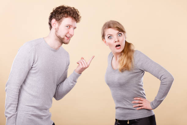 istock Young emotional couple arguing. 696059870