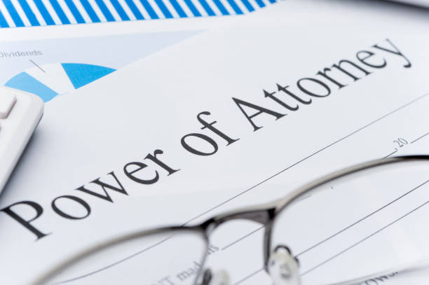 istock Blank power of attorney form with paperwork. 696067720