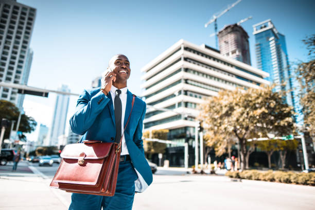 istock businessman on the phone in the miami downtown 696074032