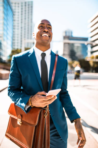 istock businessman on the phone in the miami downtown 696074202