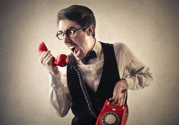 istock Man shouting in the telephone 696077244