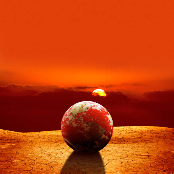 istock conceptual image of world on dried landscape 696077740