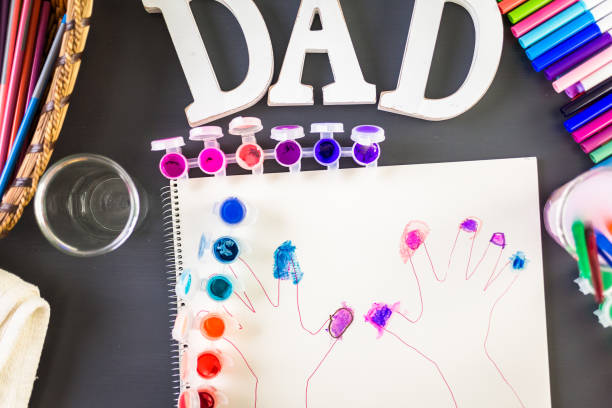 istock Little girl tracing her hands 696087554