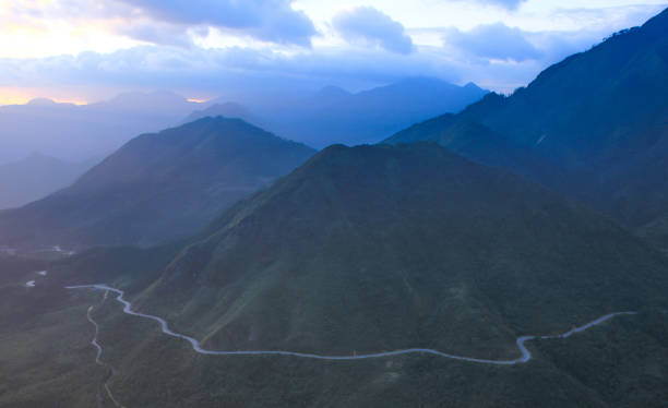 istock The sun behind the mountains at sunset time 696090426