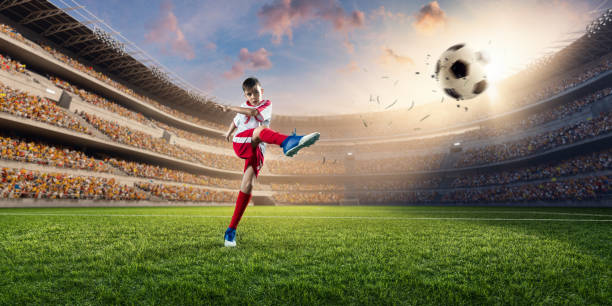 istock Soccer kids player in action in 3D stadium 696091644