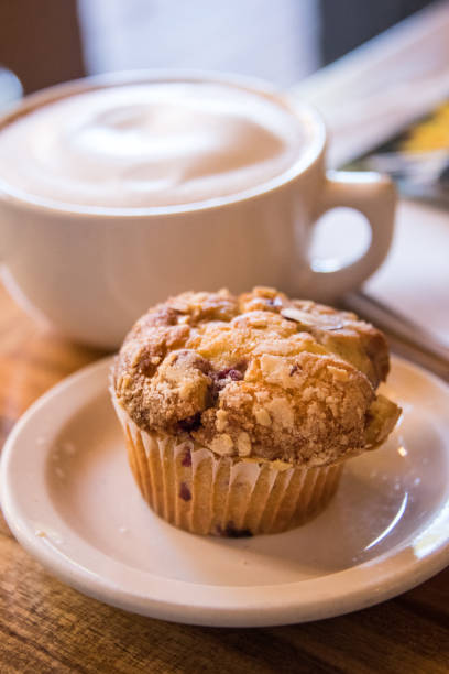 istock muffin and cappuccino 696107684
