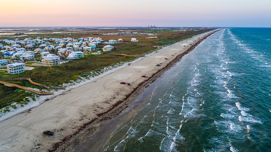 Padre Island a Colorful evening on the beach aerial drone view over the waves. Padre Island Texas Gulf Coast Paradise Getaway Secret