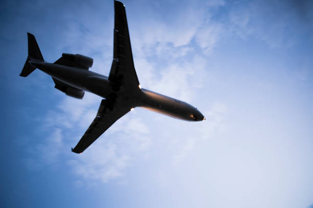 istock Close-up picture of a flying plane. 696113778