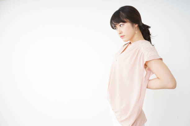 istock Young woman suffering from a backache 696117764
