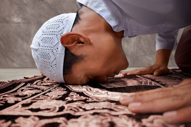 istock Muslim man praying in mosque 696137478