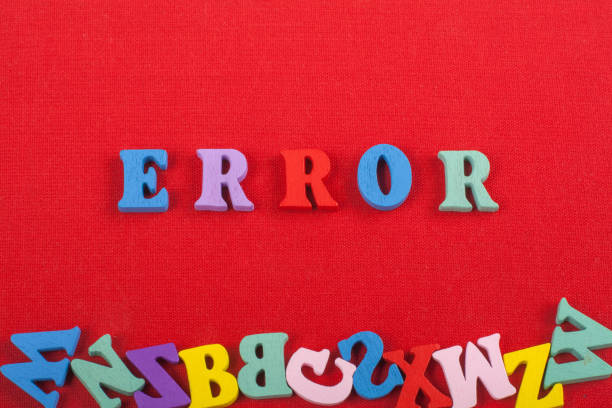 istock ERROR word on red background composed from colorful abc alphabet block wooden letters, copy space for ad text. Learning english concept 696138142
