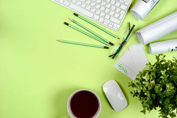 istock Office black desk table with white computer, supplies. 696140756