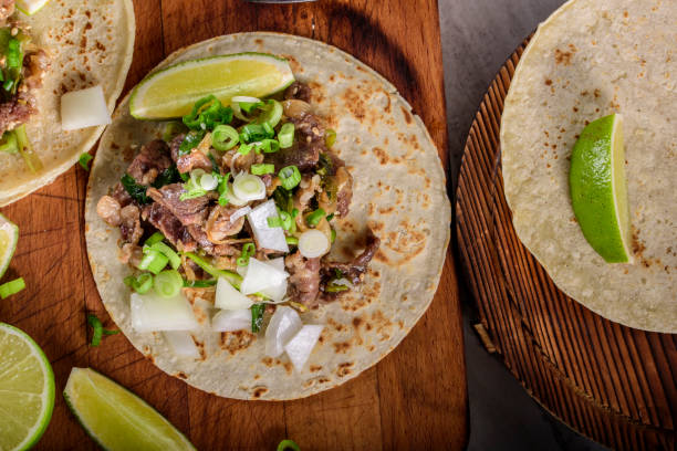 istock Bulgogi over White Corn Tortilla with Scallion and Slice of Onion 696145832