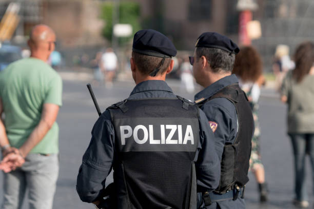 Rome, Italy - June 10, 2017: back turned Italian policeman during a street parade. The Polizia di Stato is one of the national police forces of Italy, the main police force for providing police duties
