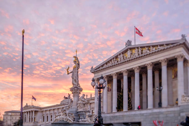 Vienna at Christmas, Parliament Building & Pallas-Athena Fountain - Austria stock photo