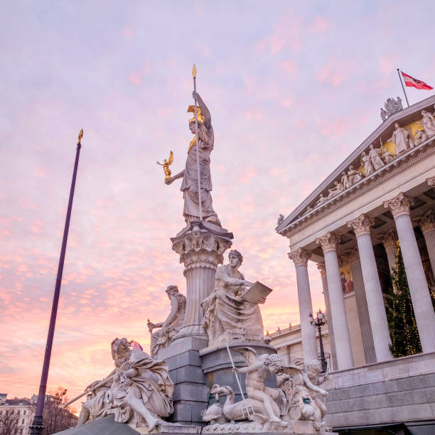 vienna at christmas, parliament building & pallas-athena fountain - austria - austrian parliament imagens e fotografias de stock