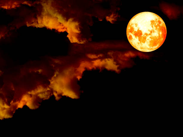 istock super blood moon in gold sky in night 696156482