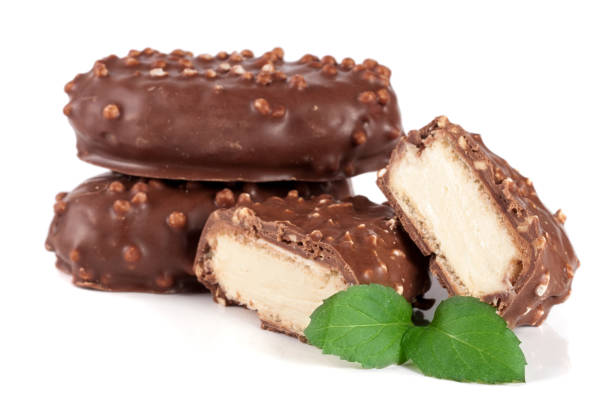 istock chocolate candy with white cream filling isolated on white background 696162424