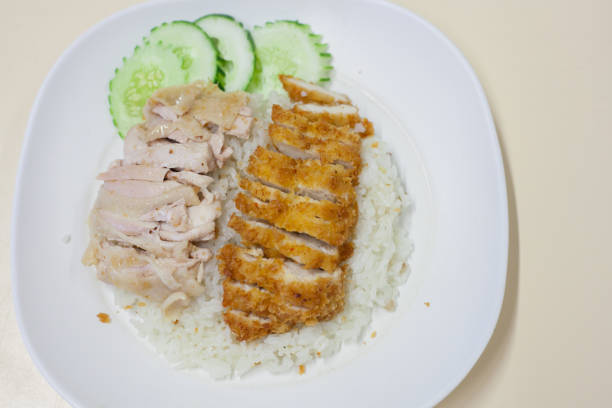 istock fried chicken and steam chicken with rice 696162970