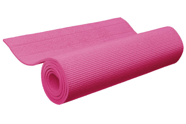 istock Pink yoga mat isolated on white background with clipping path. 696163212