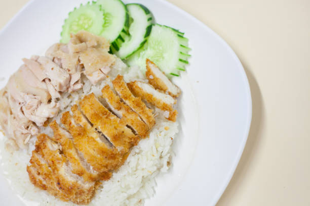 istock fried chicken and steam chicken with rice 696163306