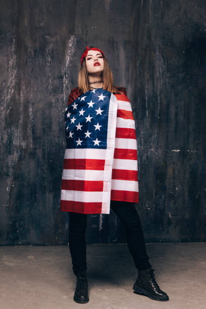 istock Proud girl dressed in USA flag 696174596