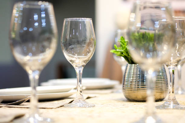 istock Plates and wine glasses on the table were empty. 696175246
