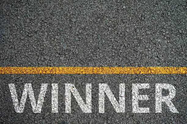 istock Winner white paint on the Asphalt roads 696175314
