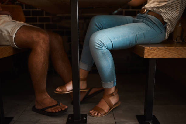 istock Playing footsy at the cafe 696178230
