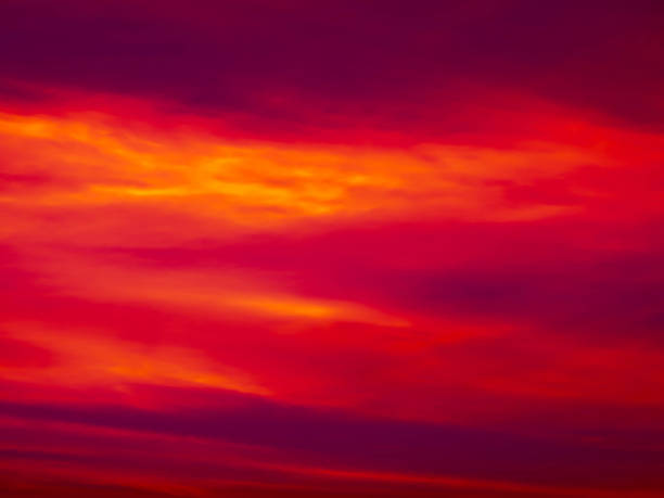 istock purple and orange clouds on the sky during sunset 696182540