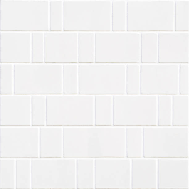 istock white wall made of pale colour bricks mosaic 696183098