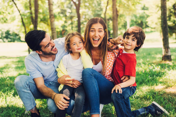 istock Young family in the park 696183476