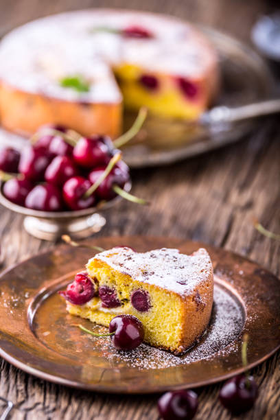 istock Cherry Cake. Assortment ingredients and cherry cake in retro style 696190934