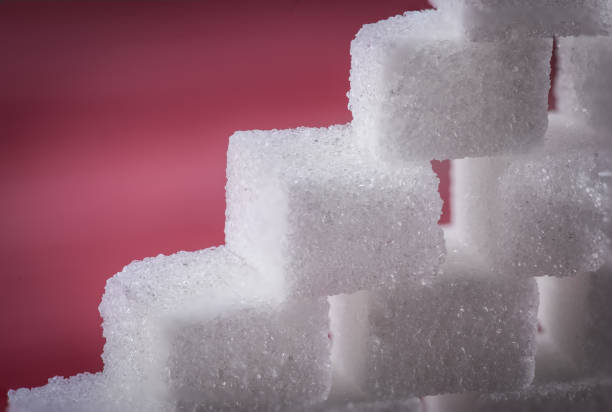istock Close up view of sugar cubes 696194988