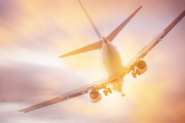 istock Close up of airplane and dramatic sky 696197986