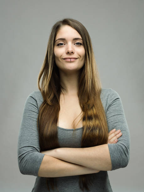 istock Real happy young woman studio portrait 696198286