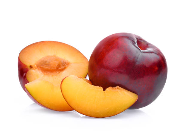 istock red cherry plum with slice isolated on white background 696200854