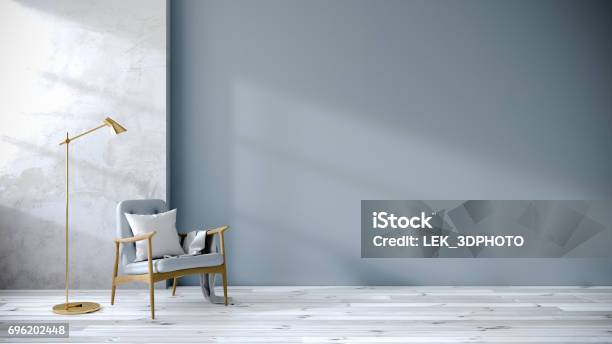 Loft Interior Of Living Room Blue Armchairs On White Flooring And Blue Wall 3d Rendering Stock Photo - Download Image Now