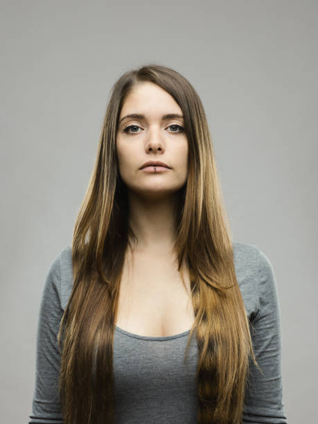 istock Real young woman studio portrait 696202776